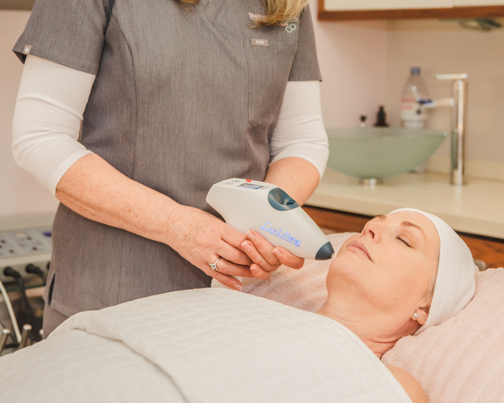 A client receives a CooLift treatment from Debbie at Simply Skincare